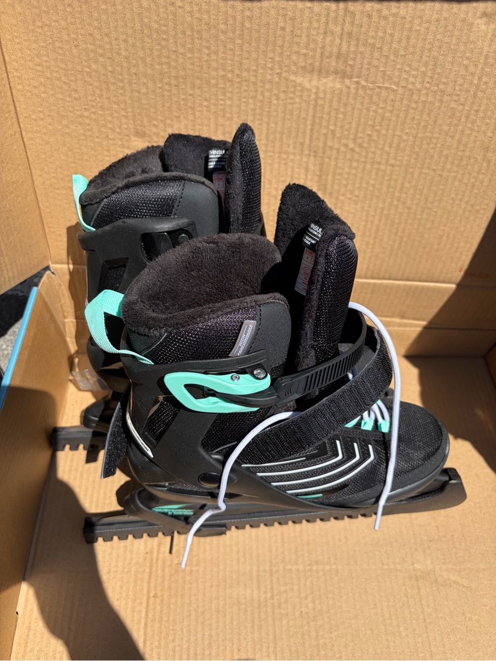 Kids Black and Mint Adjustable Ice Skates